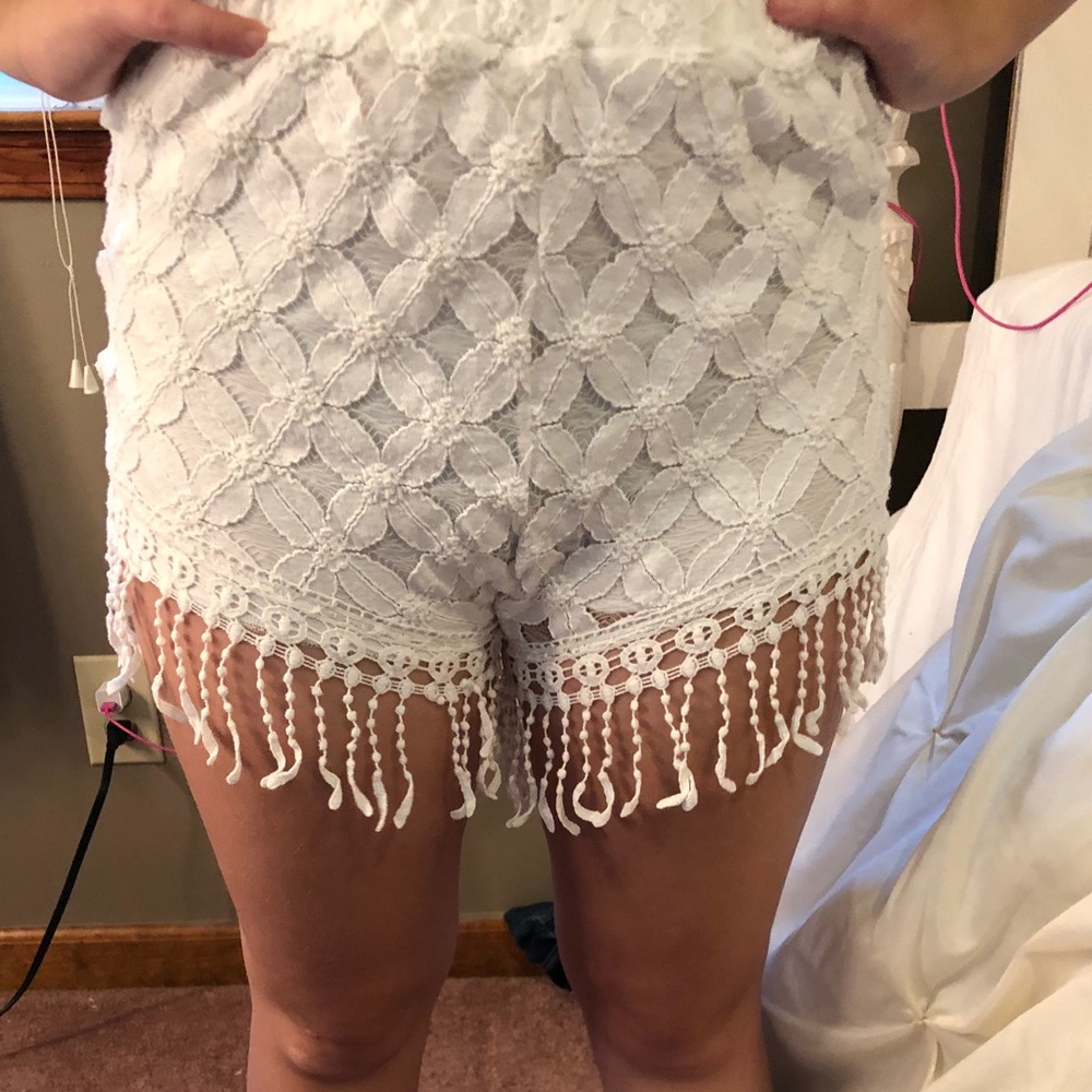 White fringe shorts